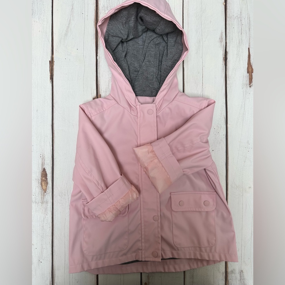 Baby girl hooded and lined raincoat.